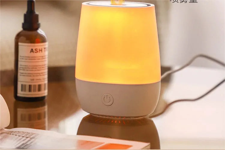 White flame effect aromatherapy diffuser humidifier with USB-C port on desk