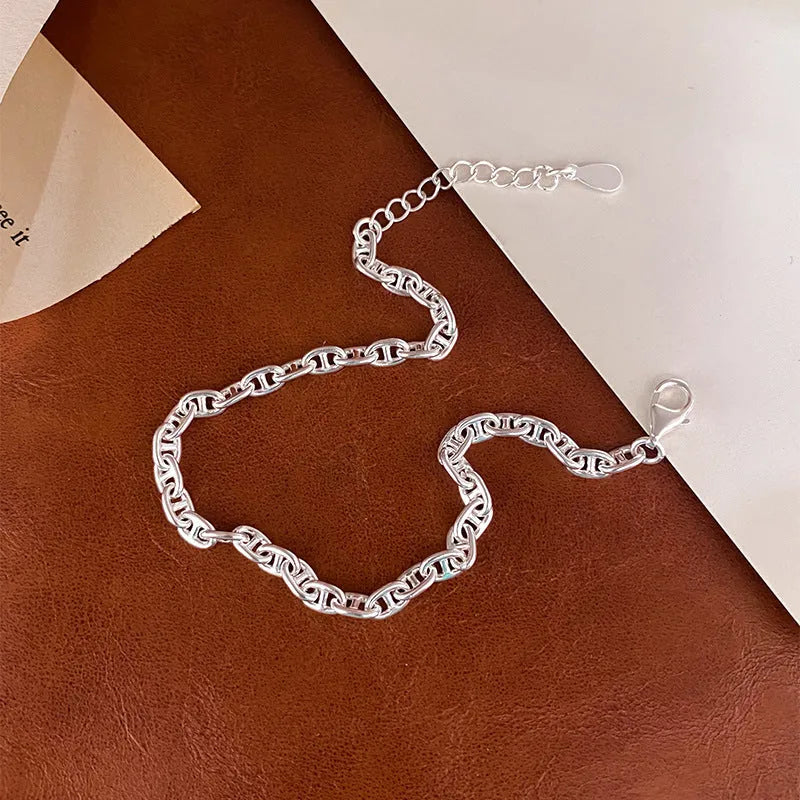 925 sterling silver chain bracelet with pig nose charm, polished silver colour, stackable design