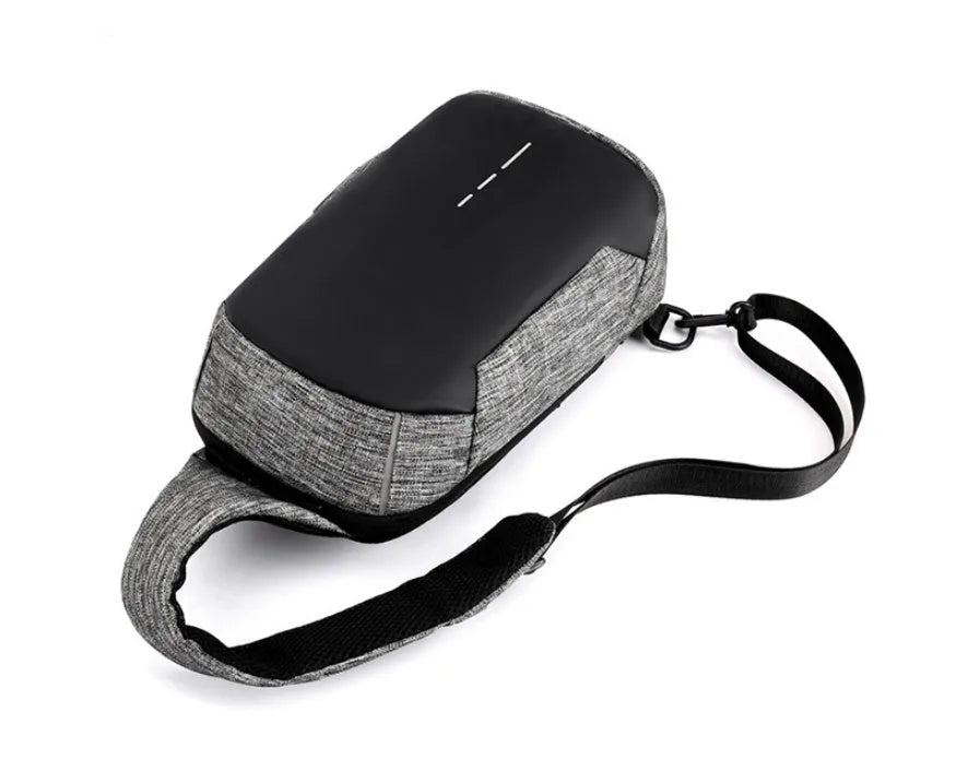 Dark blue Oxford cloth waterproof chest bag with zipper and outer pocket, shown with a phone inside.