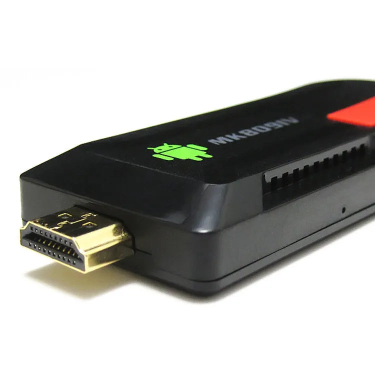 MK809 IV Android TV dongle black connected to TV via HDMI cable with remote control