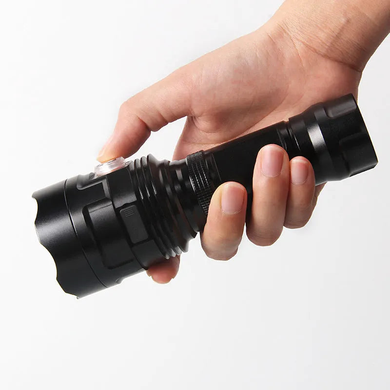 Black aluminium alloy tactical flashlight with USB charging port and multiple lighting modes