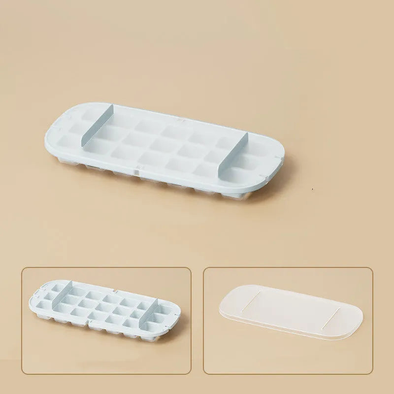 High capacity ice cube tray with leverage handle and stored ice shovel in blue colour
