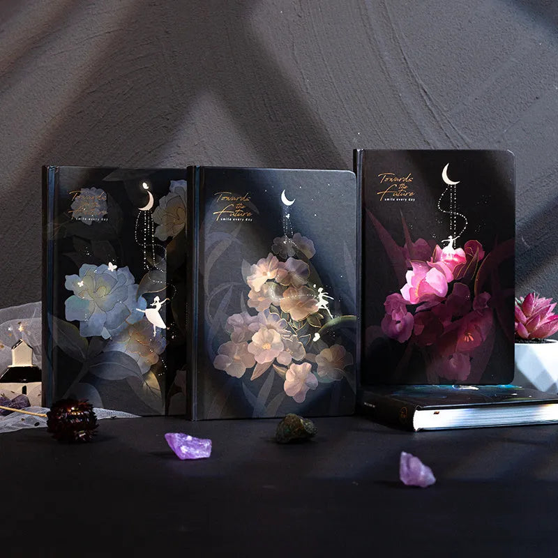A5 size notebook with a luminous reflective cover, open to show internal pages with colour illustrations.