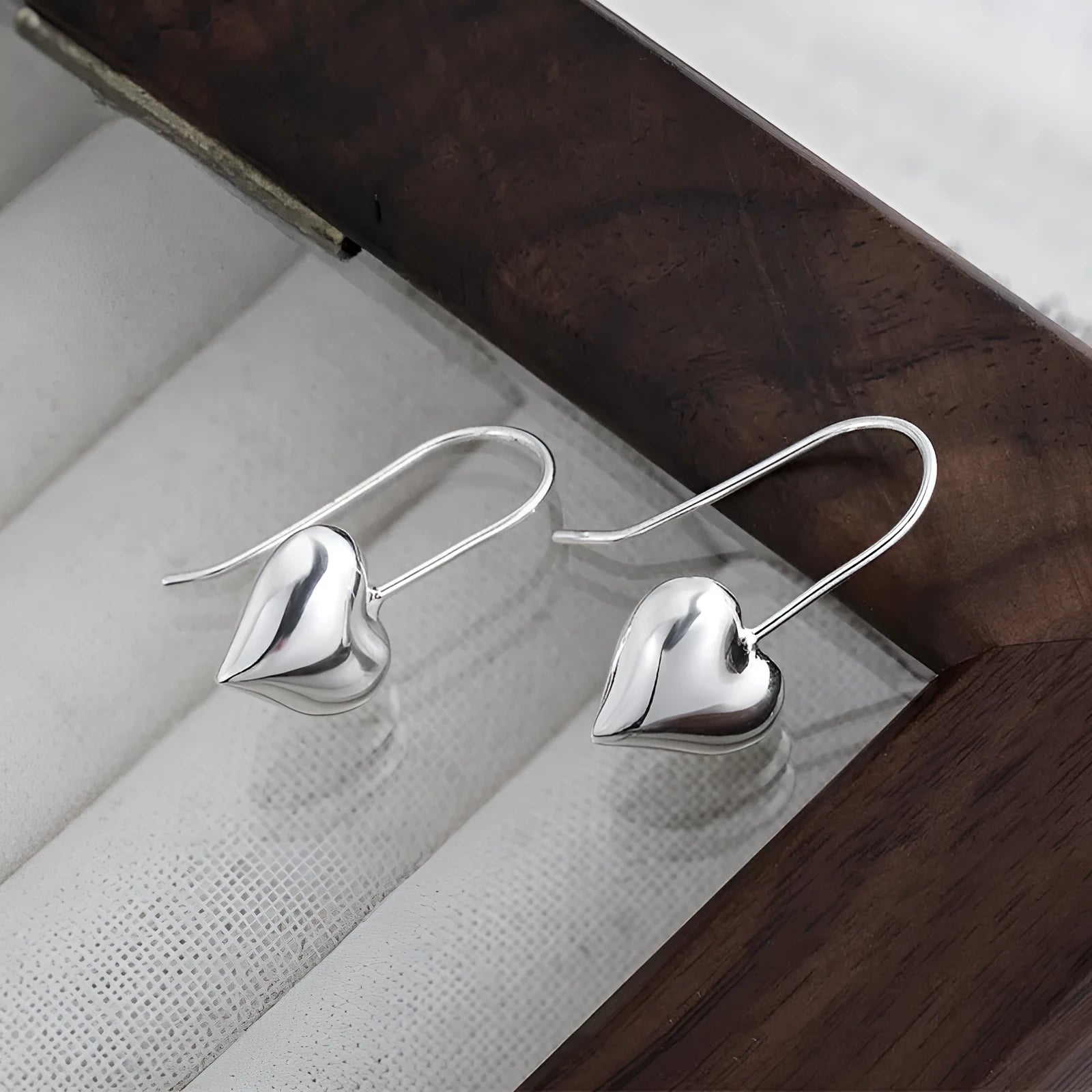 Korean style heart earrings with three-dimensional glossy finish and silver white gold plating
