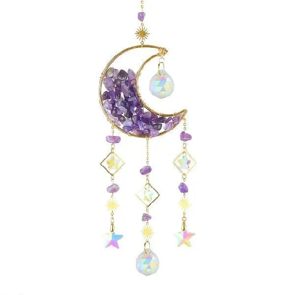 K9 crystal moon-shaped pendant on a cord for hanging in a car interior.