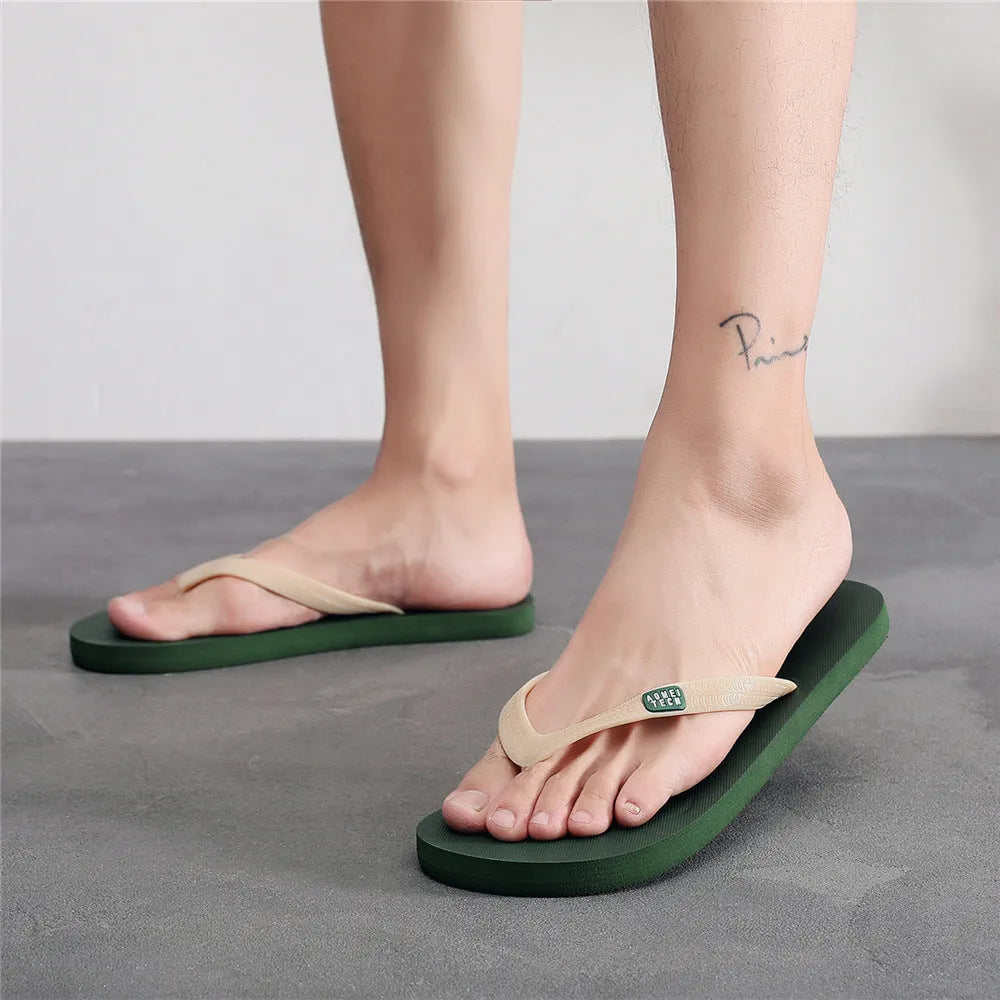 Men's black vulcanised rubber sole flip-flops with a textured EVA foam upper.