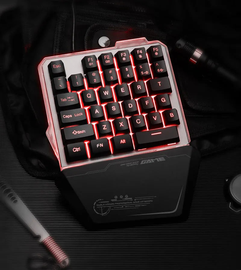 Black G40 Flow one-handed mechanical gaming keyboard with RGB backlighting on keys.