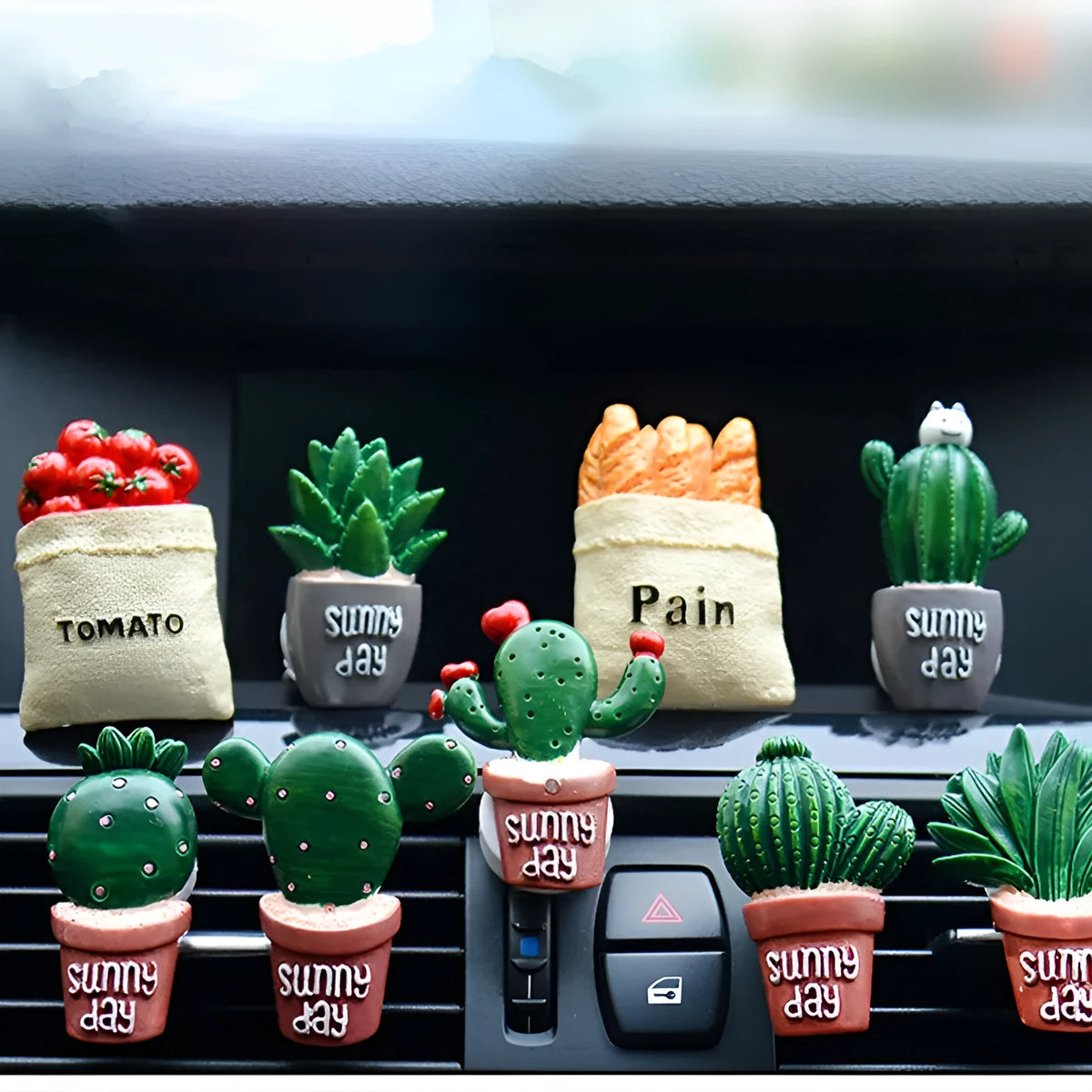 Cute green cactus car air freshener vent clip attached to car air conditioning vent