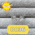 Oval denier ring with 6x8 mm stone and five-pointed star accent on open mouth copper band
