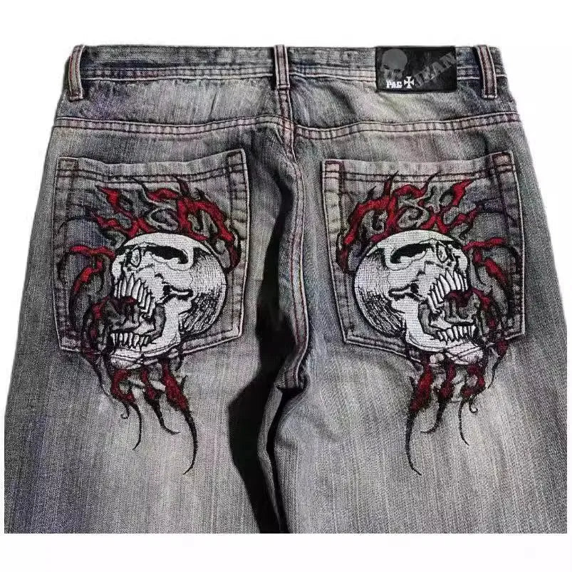 Men's grey washed-out wide-leg straight-cut denim jeans on a neutral background.