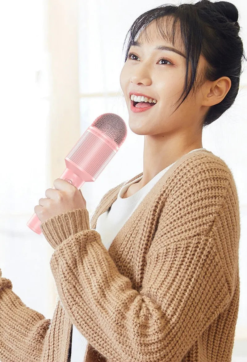 Wireless Bluetooth karaoke microphone in pink, blue, and green colour options with USB connection