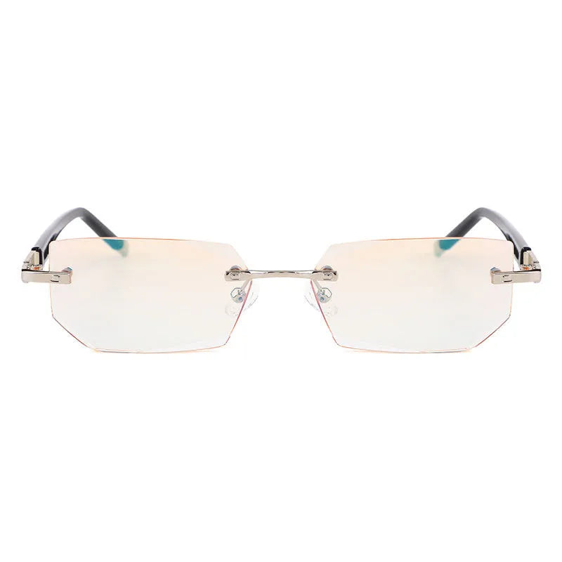 Diamond-cut metal reading glasses with tan frame and black lenses on a plain background