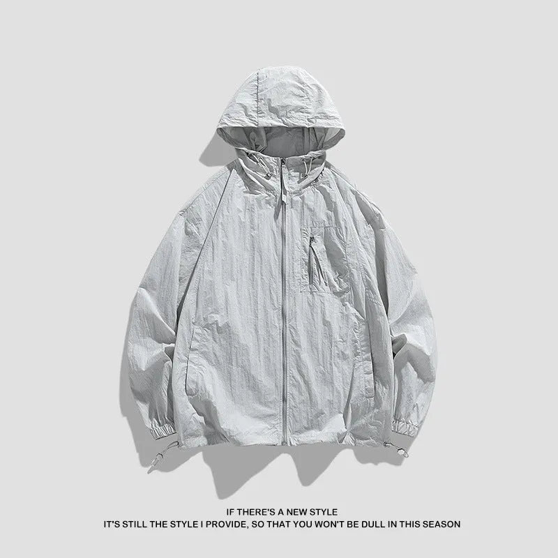 Light grey hooded sun protection jacket for men and women made from stretchy Lycra spandex fabric.