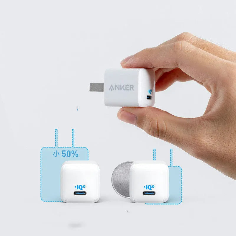 White 18W USB travel charger for mobile phones with fast charging capability