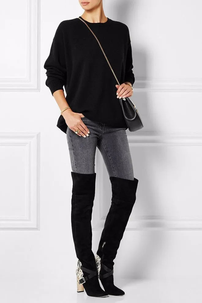 Women's black suede fashion boots with thick super high heel and round toe on a clean background