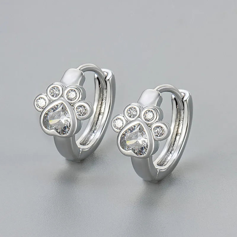 Cat paw zircon ear studs in gold and white gold copper finish
