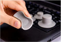 Grey durable plastic laptop cooling stand with two large and two small non-slip pads.