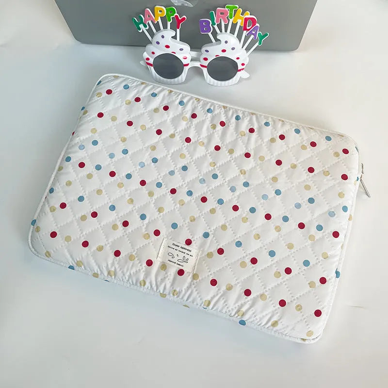 Women's polka dot laptop bag in solid colour with size options for 11, 13, and 15.6 inch computers.
