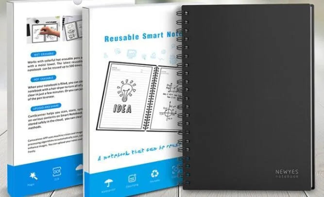 Rewritable paper notebook with black PP cover, spiral binding, and pen on a desk