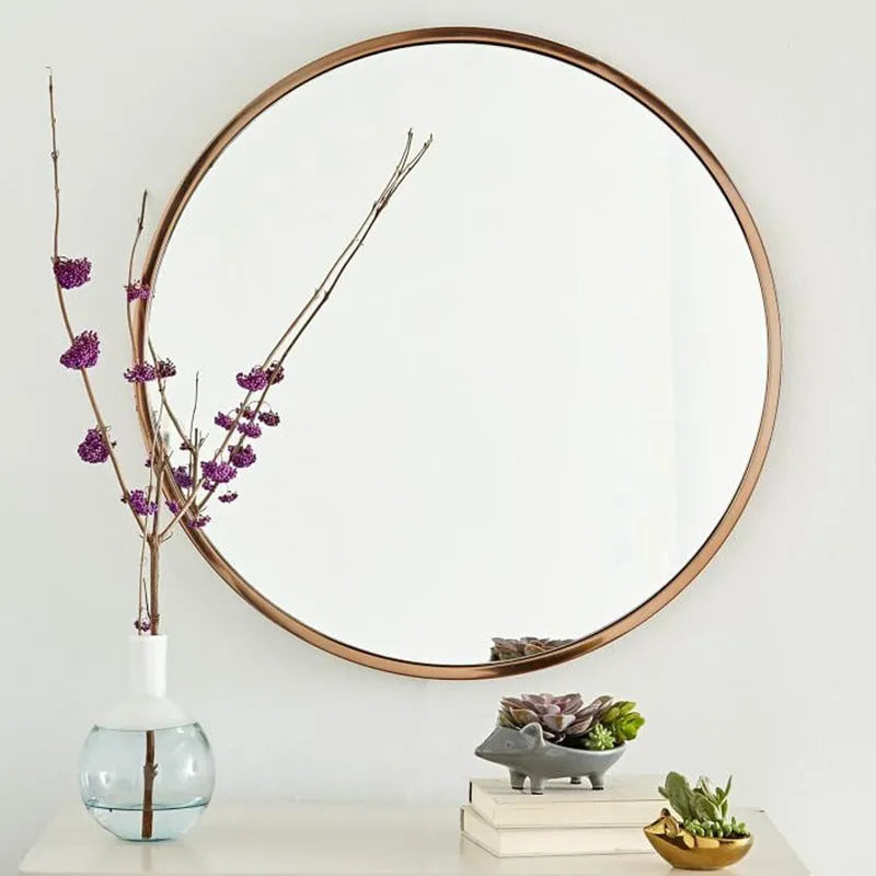 Round Nordic style bathroom wall mirror with iron frame in black, white, or gold colour, 30cm diameter.