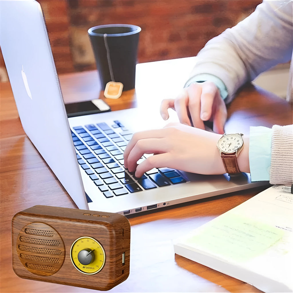 Portable Bluetooth speaker with FM radio in wood colour finish showing front speaker grille and control buttons