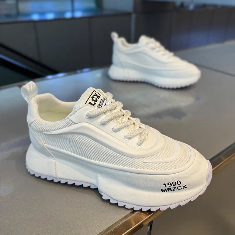 Youth Argan running sneaker with thick sole and mesh upper in white and green colour