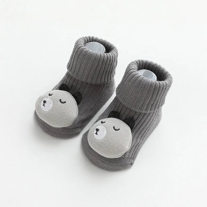 Children's combed cotton non-slip socks in multiple colours for sizes XS, S, and M.