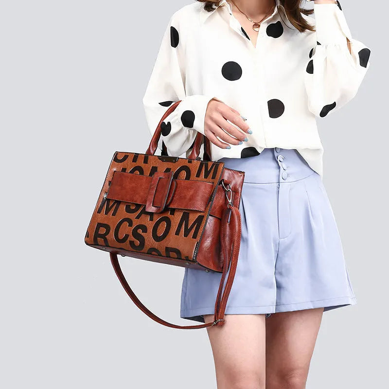 Women's PU shoulder bag in wine red, vertical square shape, hand-held single shoulder design.