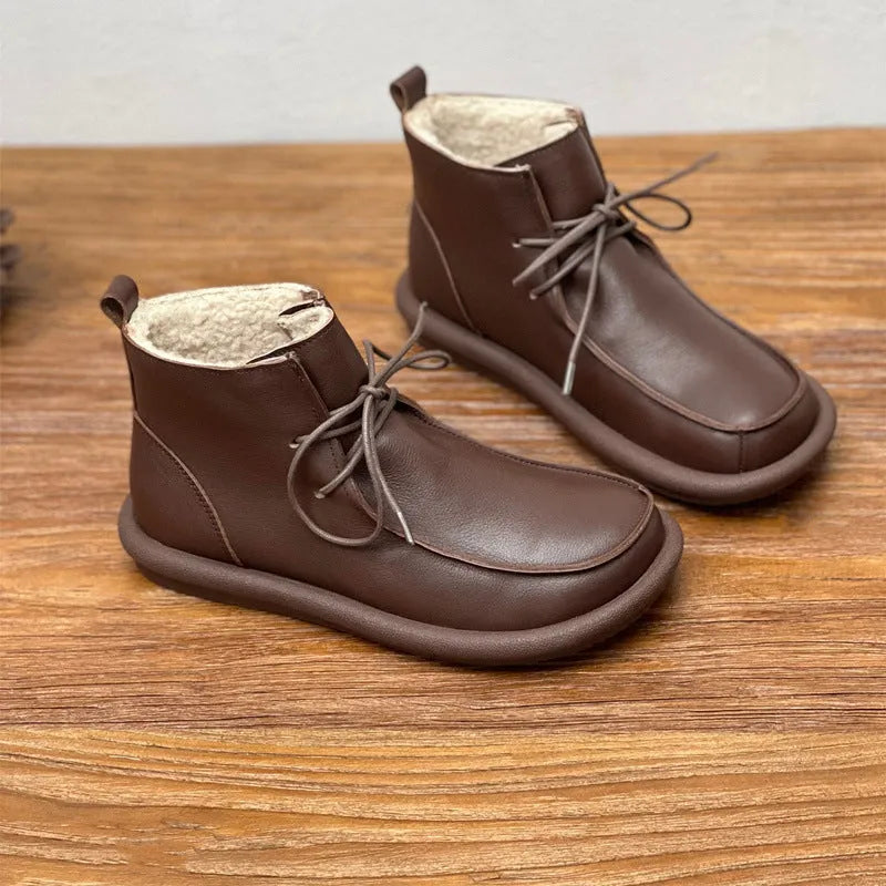 Women's cowhide boots with optional velvet lining, flat heel, round toe, and 9cm ankle sock in black and coffee colours