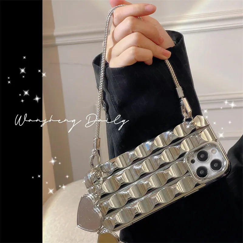 Electroplated silver heart-shaped mirror chain phone case for iPhone, concave-convex fine silver finish on a silicone back