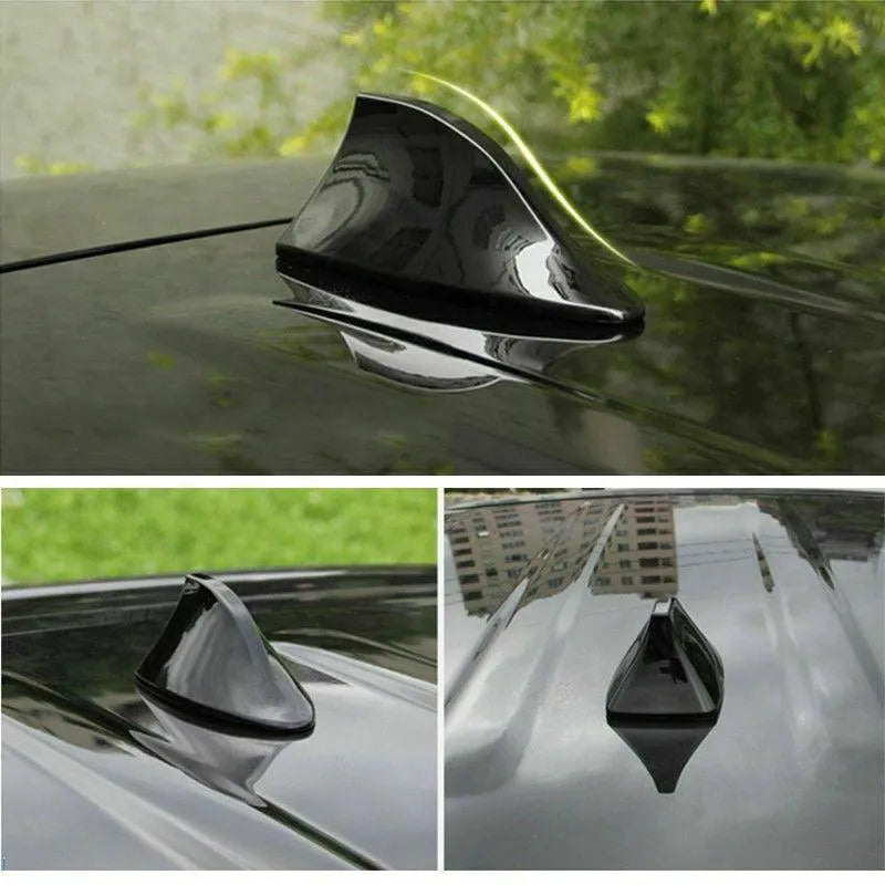 Black ABS car shark fin antenna with adhesive base for stick-on installation on a white car roof