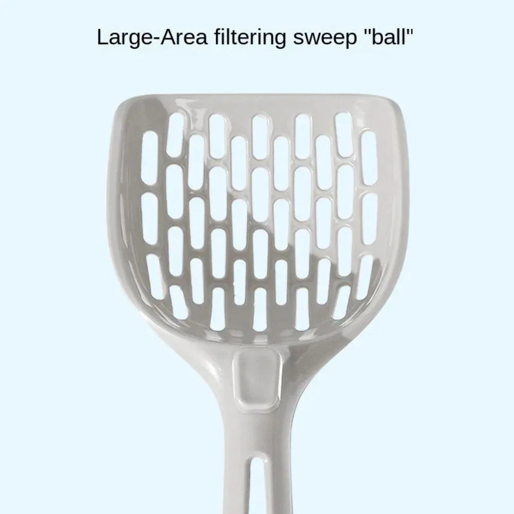 Grey plastic cat litter scoop sitting in its matching base tray