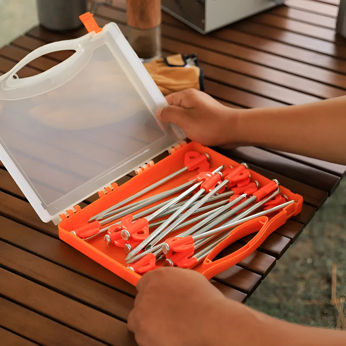 Boxed orange tent nail with small flat plastic head, 6.5 x 20.5mm camping ground stake