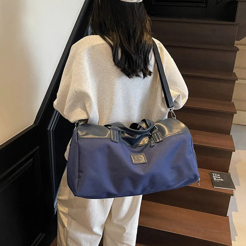 Large capacity Oxford cloth messenger bag in black blue or khaki colours