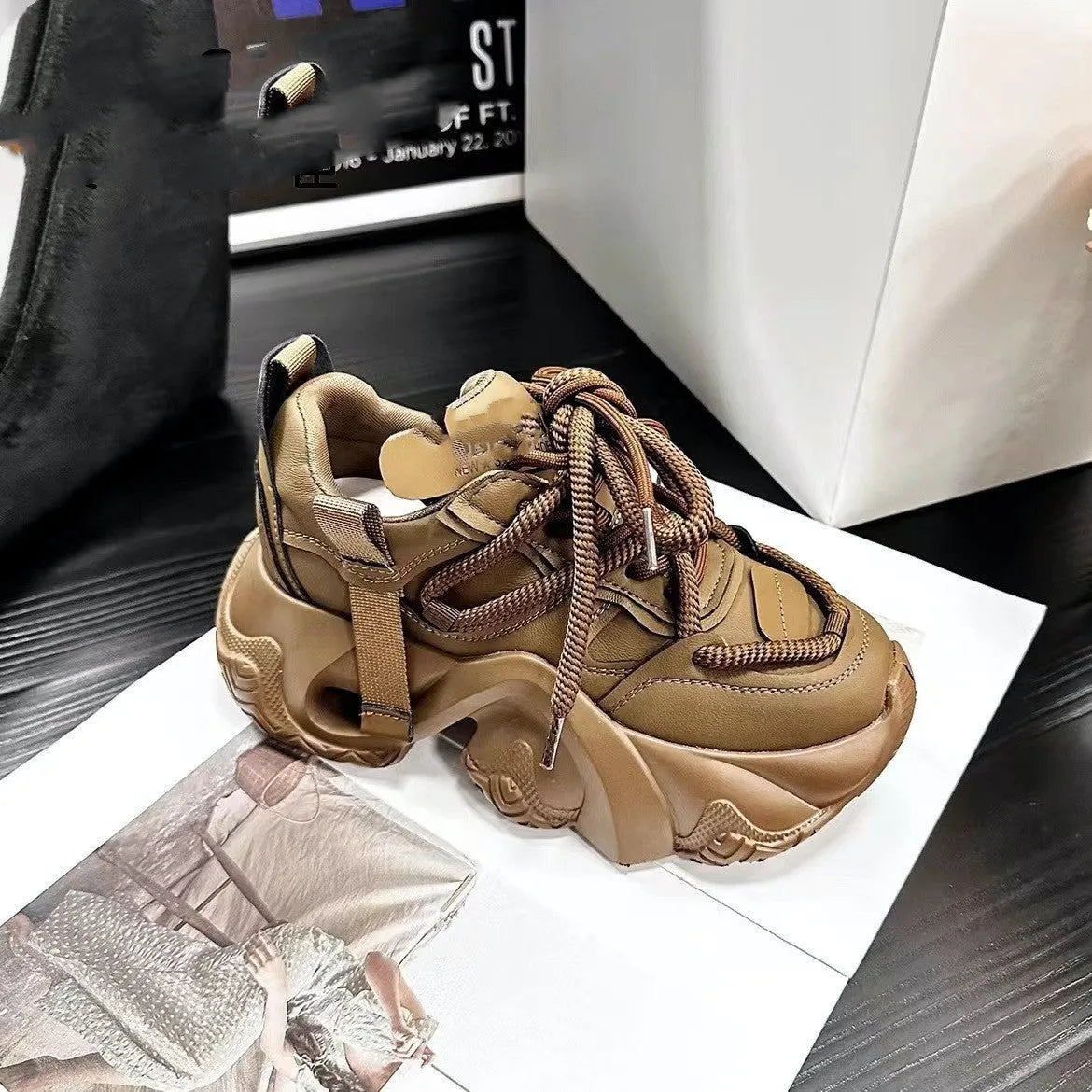 Women's creamy white casual wedge sneakers with a thick platform sole and front lace-up closure.