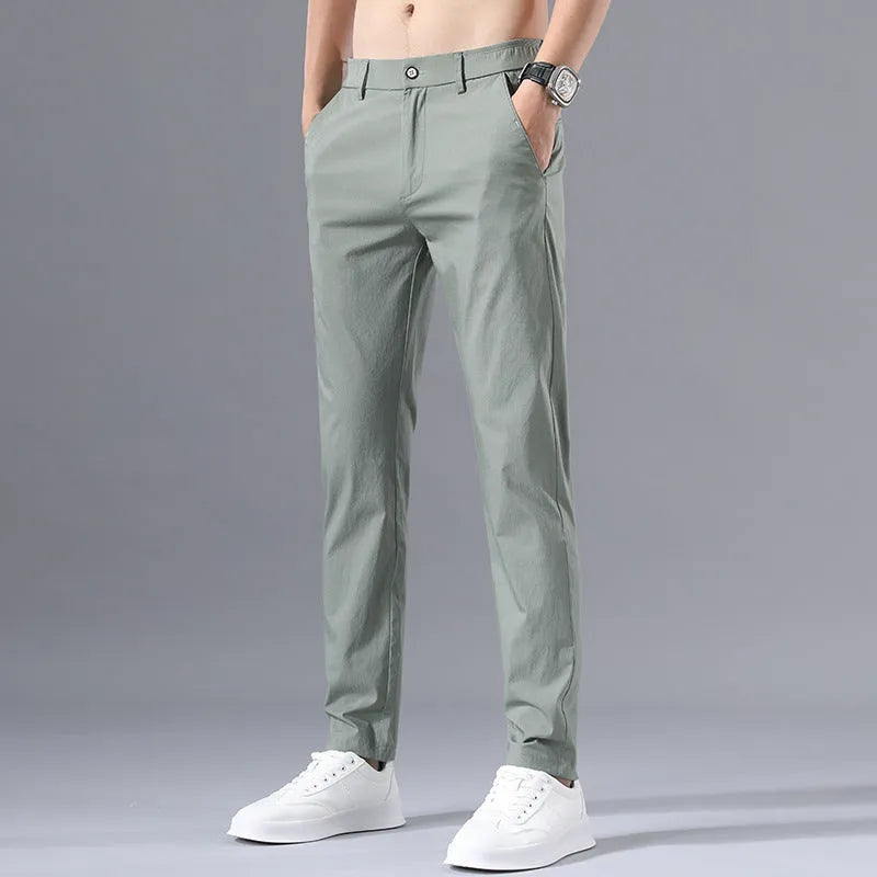 Men's summer casual trousers in straight-leg cut, thin cotton fabric, plain design, shown in black