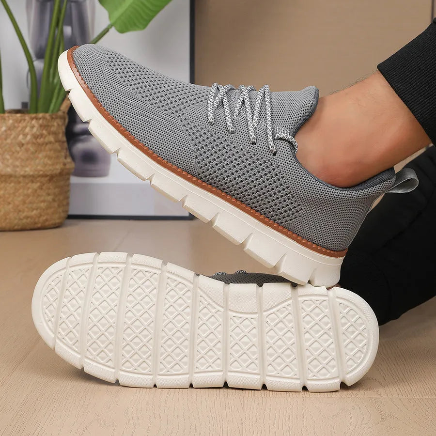 Men's grey mesh sneakers with round toe and shallow collar design