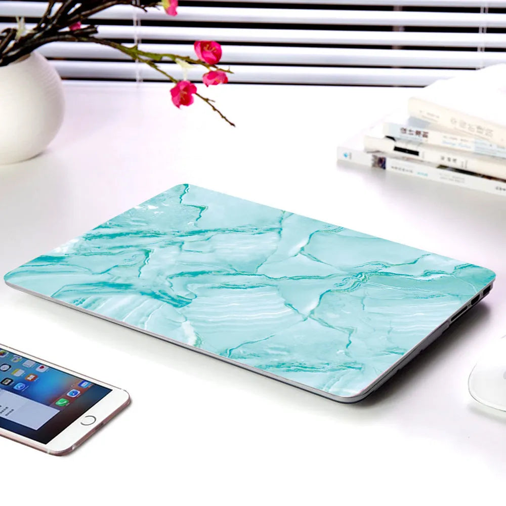 Marble pattern plastic hard case on a MacBook laptop in various colour options