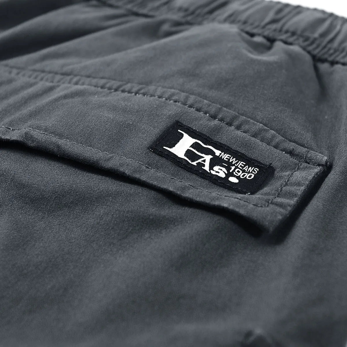 Men's cotton cargo shorts in solid black, mid-waist fit, size M to 3XL