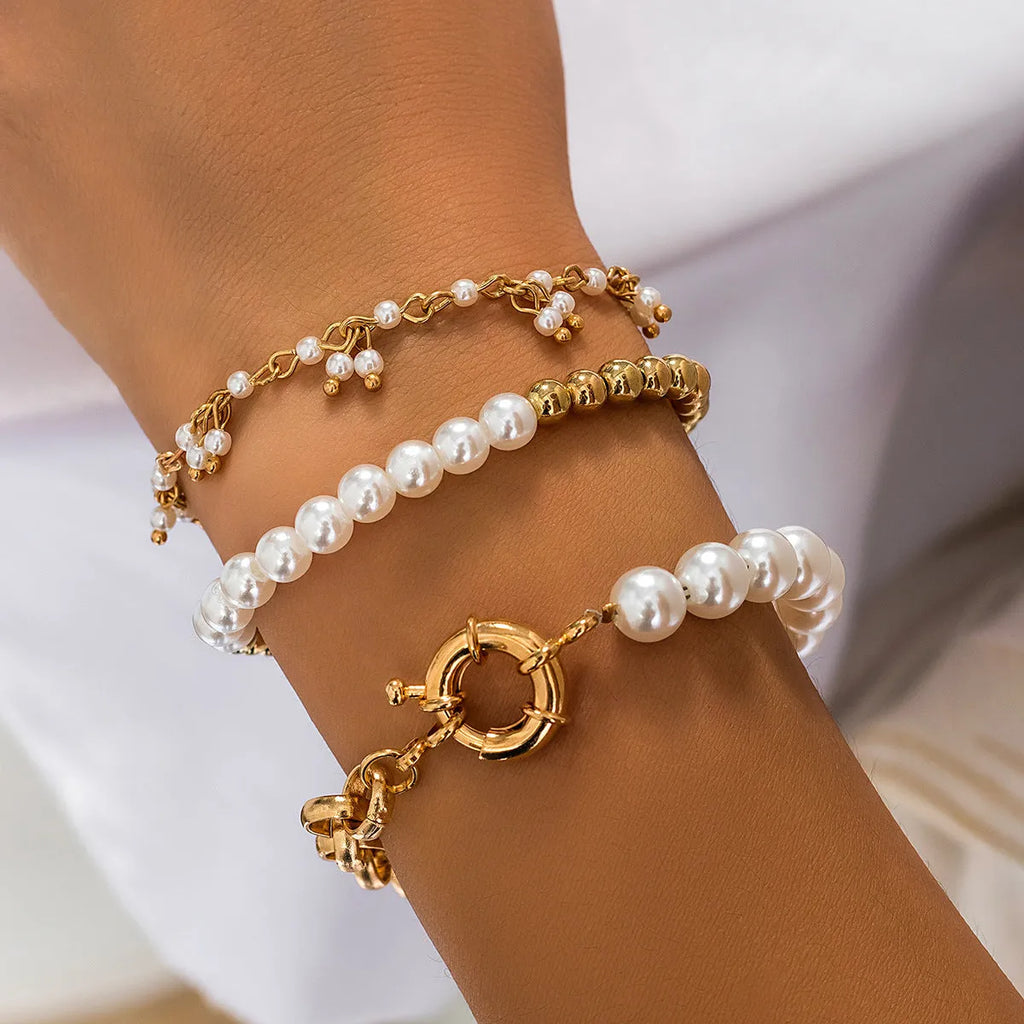 Gold alloy bracelet set with multi-portrait pearl and cartoon character design for women