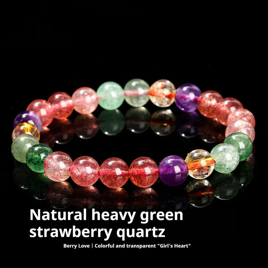Natural tourmaline colour strawberry quartz bracelet with geometric round beads on a wrist.