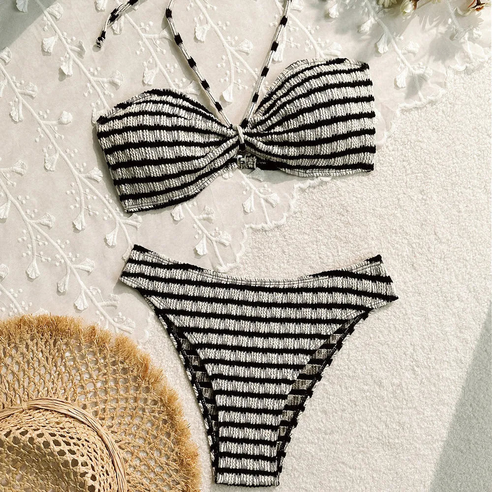 Women's striped bikini swimsuit in polyester fabric available in pink or black