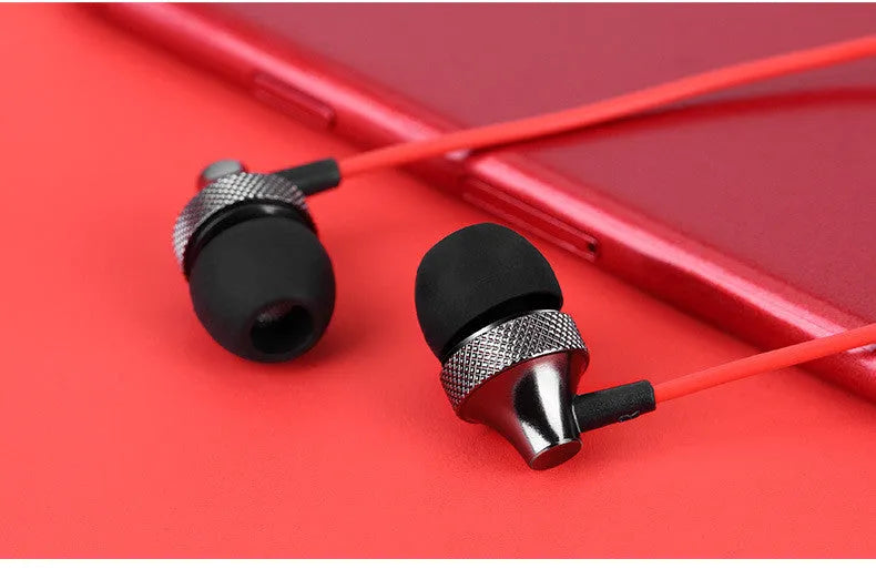 Gold metal in-ear headphones with a wheat-coloured cable and 3.5mm plug.