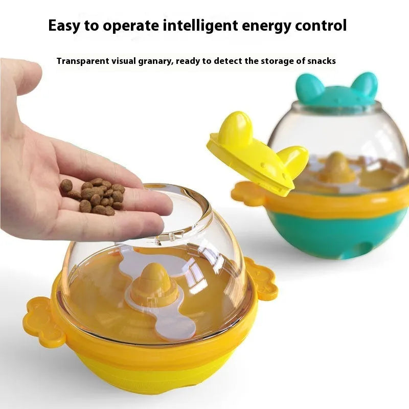 Lake blue TPR tumbler dog feeder toy with food dispenser opening, shown next to yellow version.