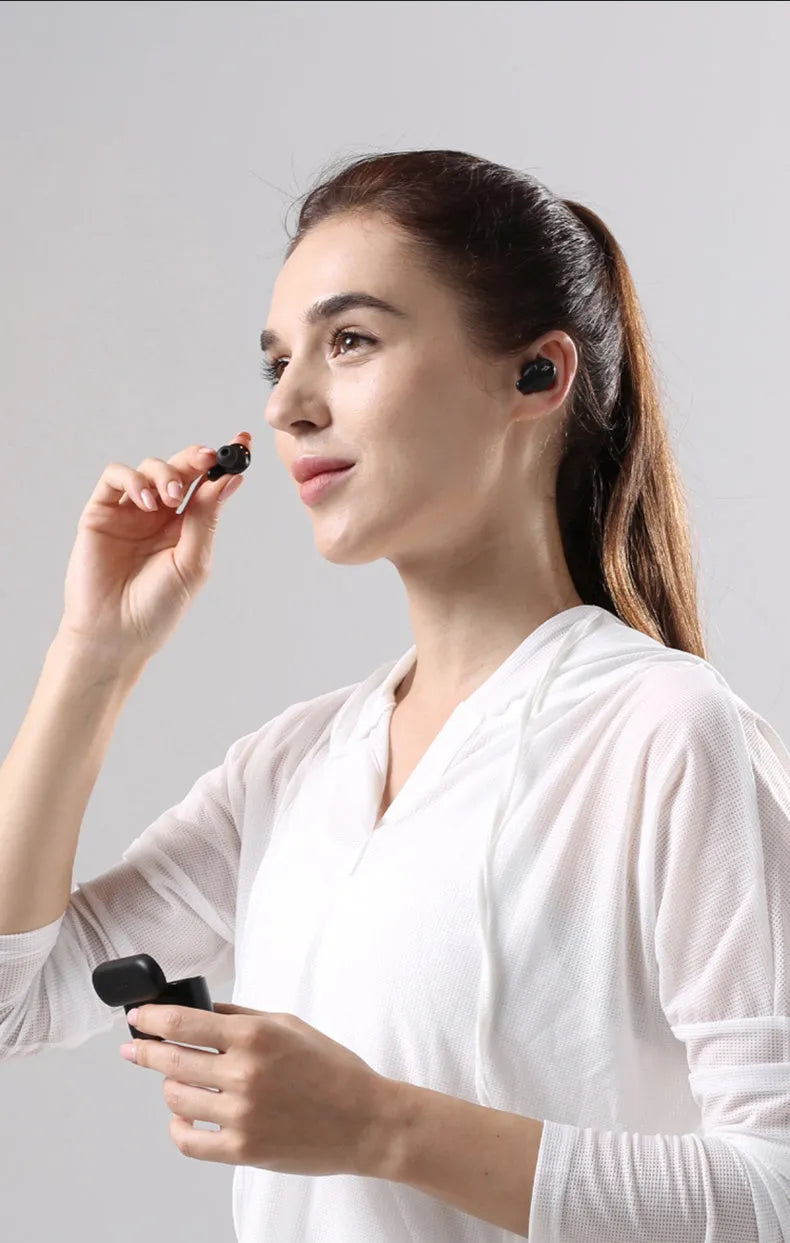True wireless Bluetooth sports headset with waterproof rating in black and white colour options