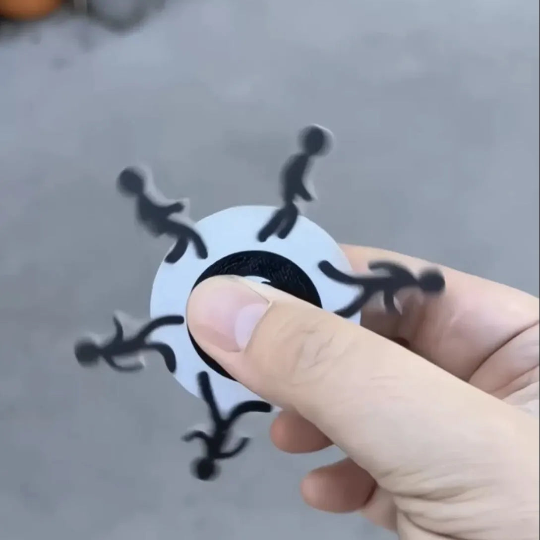 Acrylic stickman running fingertip gyro on finger showing spinning motion