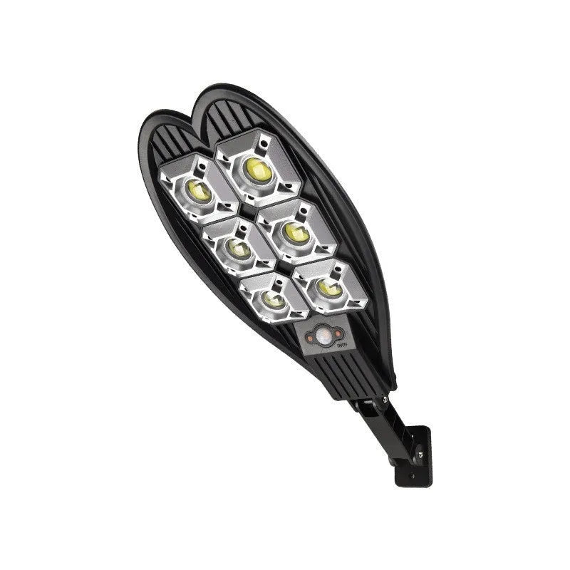 A white 6-eye sword-shaped solar garden lamp with remote control on a lawn.