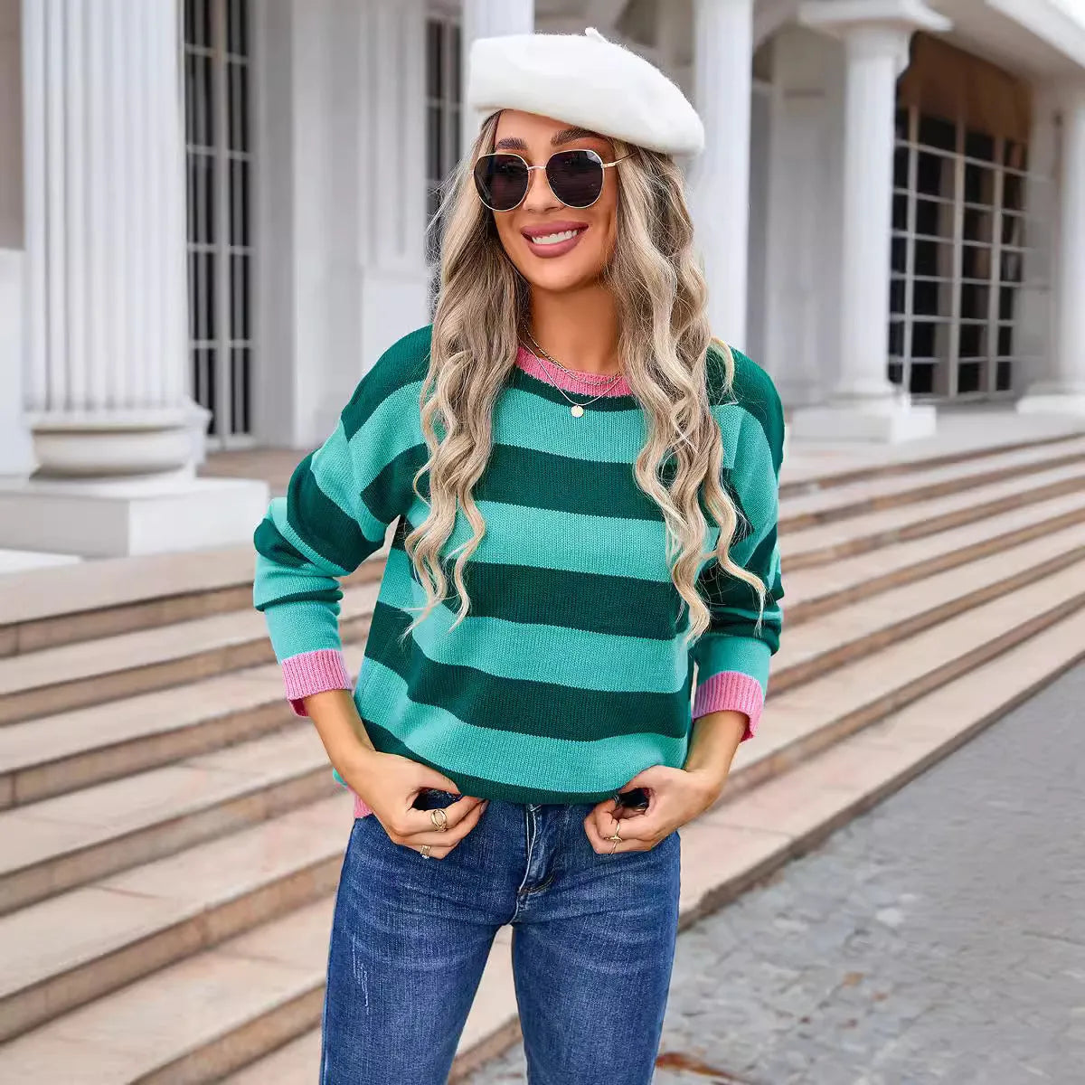 Women's loose fit long sleeve acrylic sweater in striped or plaid pattern