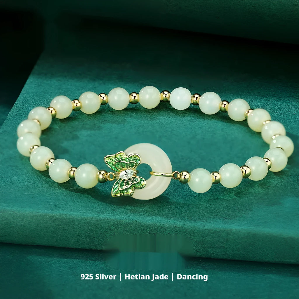 Cyan Hetian jade bracelet for women with a sterling silver butterfly inlay
