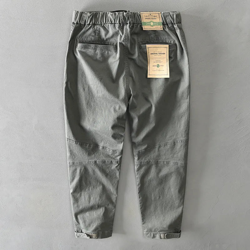Men's casual Japanese overalls in cotton with micro-elastic properties showing loose fit trousers design